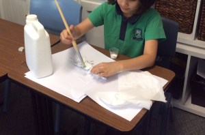 A student making a dragon for a Green screen movie.